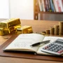 Comment investir dans l'or sans se faire piéger par les frais cachés =